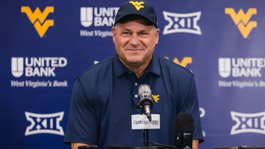 West Virginia coach Rich Rodriguez visits with media in the Milan Puskar Center Team Room on Tuesday, Sept.10, ahead of the Mountaineers' meeting with UT Martin.