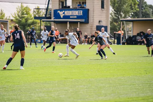 Layla Thompson dribbles the ball during a game at Dick Dlesk Soccer Stadium.