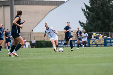Anna Hauer passes a ball during a game at Dick Dlesk Soccer Stadium on Sept. 13.