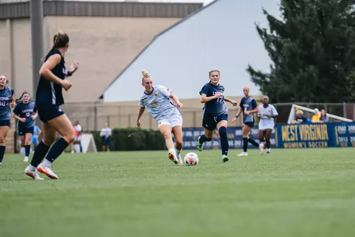 Anna Hauer passes a ball during a game at Dick Dlesk Soccer Stadium on Sept. 13.