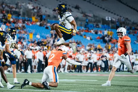 Quarterback Michael Hawkins Jr. (3) scores a rushing touchdown in the first quarter against No. 25 Virginia at Bank of America Stadium on Sept. 19, 2026, in Charlotte, N.C.