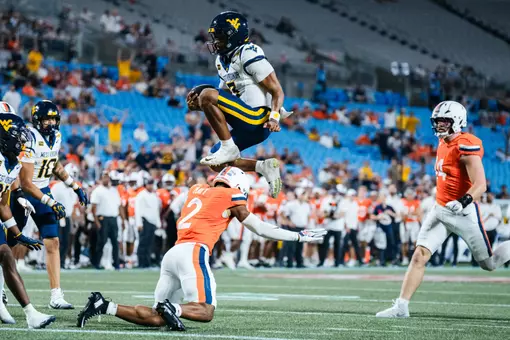 Quarterback Michael Hawkins Jr. (3) scores a rushing touchdown in the first quarter against No. 25 Virginia at Bank of America Stadium on Sept. 19, 2026, in Charlotte, N.C.