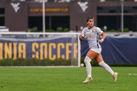 Maria Delyannis runs down the field during a match at Dick Dlesk Soccer Stadium.