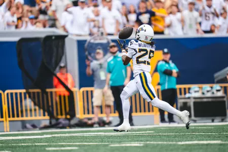 Wide receiver Armani Weaver-Bomar (25) scores his first career touchdown for West Virginia against Coastal Carolina at Milan Puskar Stadium in Morgantown, W.Va., on Sept. 5, 2026.