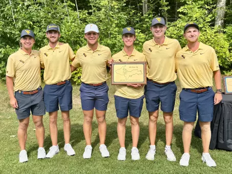 A picture of WVU posing with their runner-up trophy at the Island Resort Collegiate