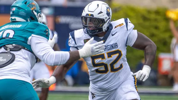 Corey McIntyre Jr. rushes the passer during last Saturday's 31-24 season-opening victory over Coastal Carolina at Milan Puskar Stadium.