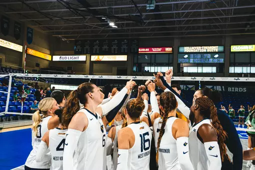 WVU Volleyball Team Huddle during the FGCU match