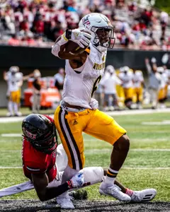 Cowboys get the win at Northern Illinois at Huskie Stadium