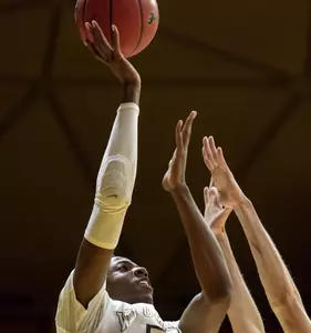 Cowboys Downed by Aggies, 88-70, in MW Tourney Image