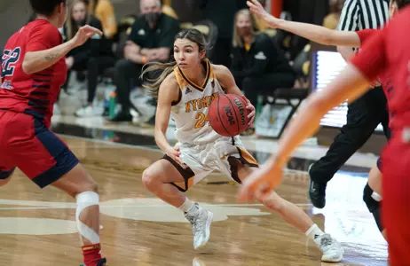 Jan 2, 2021; Laramie, WY, USA; Wyoming Wyoming Cowgirls guard Tommi Olson (24) drives against the Fresno State Bulldogs at Arena-Auditorium. Mandatory Credit: Troy Babbitt-UW Media-Athletics