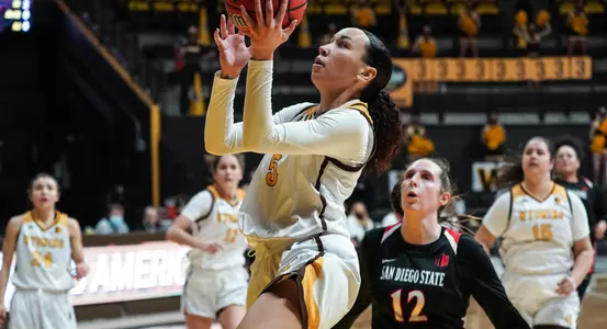 Jan 30, 2021; Laramie, WY, USA; Wyoming Cowgirls forward Jaye Johnson (5) shoots against the San Diego State Aztecs at Arena-Auditorium. The Cowgirls beat the Aztecs 62-41. Mandatory Credit: Troy Babbitt-UW Media-Athletics