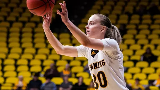 Nov 18, 2022; Laramie, WY, USA; Wyoming Cowgirls guard Ola Ustowska (30) against the Denver Pioneers at Arena-Auditorium. Mandatory Credit: Troy Babbitt-UW Media-Athletics