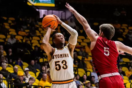 Nov 10, 2022; Laramie, WY, USA; Wyoming Cowboys guard Xavier DuSell (53) against the Nicholls State Colonels at Arena-Auditorium. The Cowboys beat the Colonels 79-68. Mandatory Credit: Troy Babbitt-UW Media-Athletics