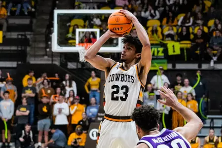 Dec 3, 2022; Laramie, WY, USA; Wyoming Cowboys forward Max Agbonkpolo (23) against the Grand Canyon Antelopes at Arena-Auditorium. The Cowboys lost to the Antelopes 66-58. Mandatory Credit: Troy Babbitt-UW Media-Athletics