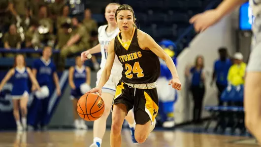 Jan 11, 2023; Colorado Springs, USAFA, CO, USA; Wyoming Cowgirls guard Tommi Olson (24) against the Air Force Falcons at Clune Arena. Mandatory Credit: Troy Babbitt-UW Media-Athletics