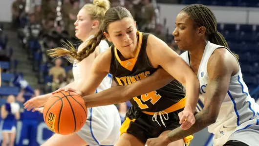 Jan 11, 2023; Colorado Springs, USAFA, CO, USA; Wyoming Cowgirls guard Quinn Weidemann (14) against the Air Force Falcons at Clune Arena. Mandatory Credit: Troy Babbitt-UW Media-Athletics