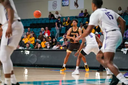 Cowboys Use Three-Ball to Sink Furman 78-71 on Sunday Morning Image