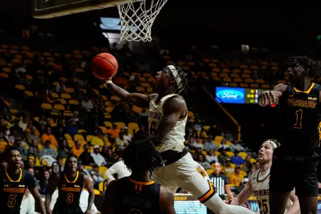 Nov 22, 2024; Laramie, WY, USA; Wyoming Cowboys guard Jordan Nesbitt (16) against the Southeastern Louisiana Lions at Arena-Auditorium. The Cowboys beat the Lions 64-61. Mandatory Credit: Troy Babbitt-UW Media-Athletics