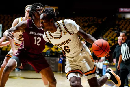 Dec 19, 2024; Laramie, WY, USA; Wyoming Cowboys guard Jordan Nesbitt (16) against the Bellarmine Knights at Arena-Auditorium. Mandatory Credit: Troy Babbitt-UW Media-Athletics