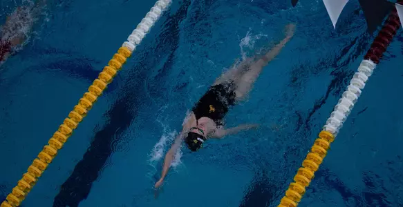 Kayla Cunningham swimming backstroke