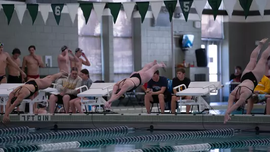 Avery True diving from the blocks at dual against Utah in Green River, Wyo.