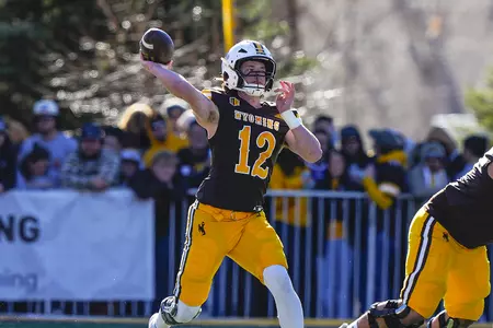 Nov 22, 2025; Laramie, WY, USA; Wyoming Cowboys quarterback Kaden Anderson (12) against the Nevada Wolf Pack at Jonah Field at War Memorial Stadium. Mandatory Credit: Troy Babbitt-UW Media-Athletics