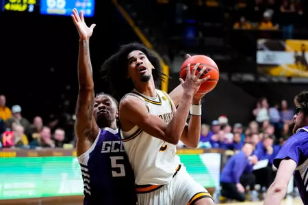 Dec 20, 2025; Laramie, WY, USA; Wyoming Cowboys guard Nasir (Naz) Meyer (2) against the Grand Canyon University Lopes at Arena-Auditorium. The Cowboys lost to the Lopes 82-70. Mandatory Credit: Troy Babbitt-UW Media-Athletics