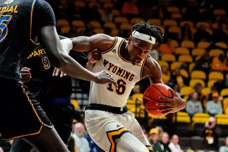 Feb 22, 2025; Laramie, WY, USA; Wyoming Cowboys guard Jordan Nesbitt (16) against the San Jose State Spartans at Arena-Auditorium. Mandatory Credit: Troy Babbitt-UW Media-Athletics