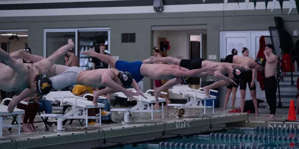 Luke O'Connor diving into the pool