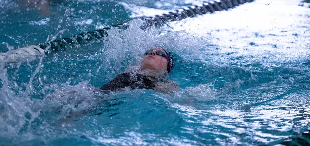 Makenna Reiner swimming backstroke