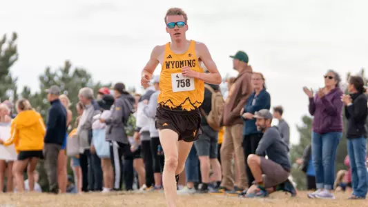 Jacob White running at the Wyoming Invite
