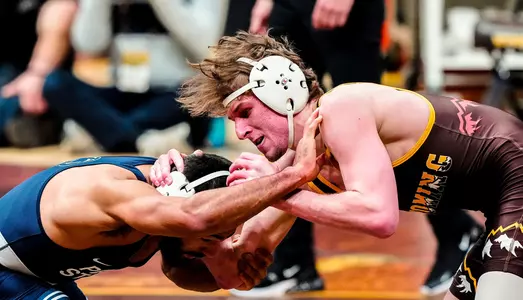 Dec 13, 2025; Laramie, WY, USA; Wyoming Cowboys wrestler No. 27 Gabe Willochell wrestles with Penn State Nittany Lions wrestler No. 1 Shayne Van Ness during the 149 pounds match of a NCAA wrestling dual match between the Wyoming Cowboys and the #1 Penn State Nittany Lions at Arena-Auditorium. Mandatory Credit: Troy Babbitt-UW Media-Athletics