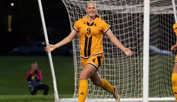 Wyoming forward Brooke Brown celebrates her goal at Northern Colorado