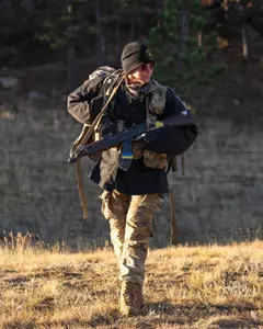 Cross Country runner Eowyn Dalbec in a field training with UW ROTC