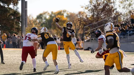Tyler Hughes throws a pass vs. NIU
