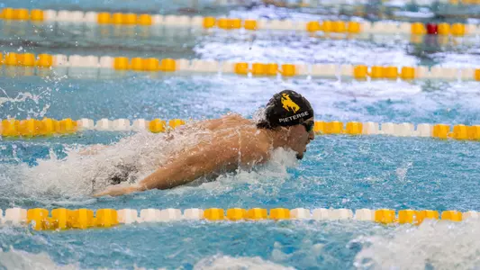 Antonie Pieterse swimming the breaststroke at the 2026 Brown vs. Gold meet