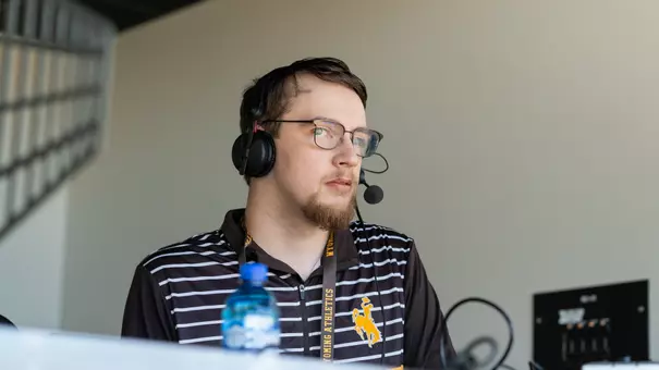 Logan Hunter in the home radio booth at War Memorial Stadium