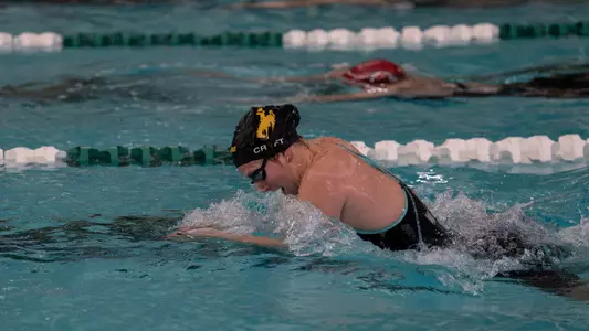 Taylor Craft swimming the breaststroke in the Utah duel