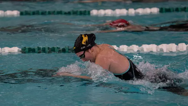 Taylor Craft swimming the breaststroke in the Utah duel