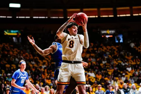 Kiani Saxon grabs a rebound against Air Force in 2026