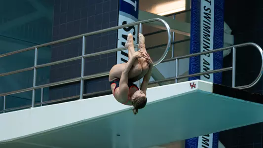 Alicia Gonzalez diving off the 3-meter board at MW Championships