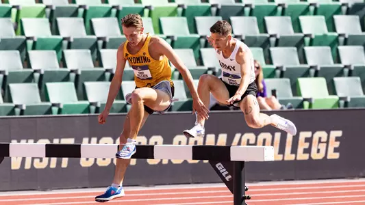 Ryker Holtzen jumping over a hurdle in the 3,000-meter steeplechase at the 2025 NCAA Outdoor Championships