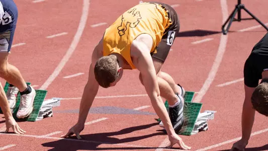 Bridger Norton on the blocks at the Doug Max Invitational at Colorado State
