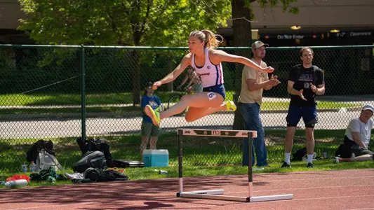Gabbreiella Mendoza-Molina running in the 400-meter hurdles at the Doug Max Invitational