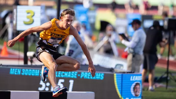 Ryker Holtzen jumping over a barrier in the 3,000-meter steeplechase semifinal at the NCAA Outdoor Championships