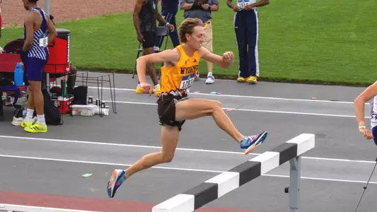 Ryker Holtzen jumping over a steeple at the NCAA West First Round