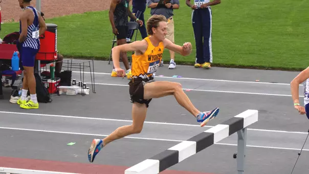 Ryker Holtzen jumping over a steeple at the NCAA West First Round