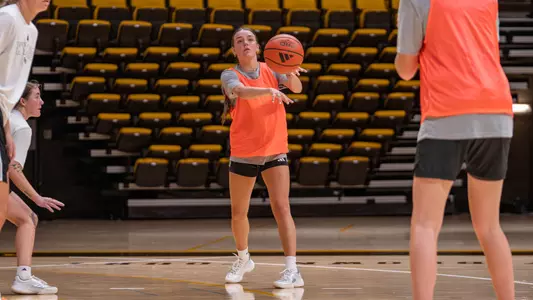 Zoey Blackwell passes the basketball