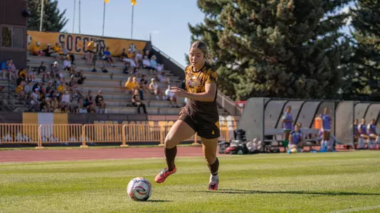 Isabel Vasco dribbles the ball in a match against Weber State on Aug. 20 at the Madrid Sports Complex