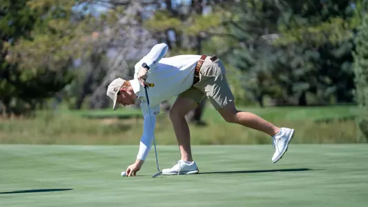 Brody Leid marks his ball during Round 1 of the Ram Masters Invite at Fort Collins Country Club